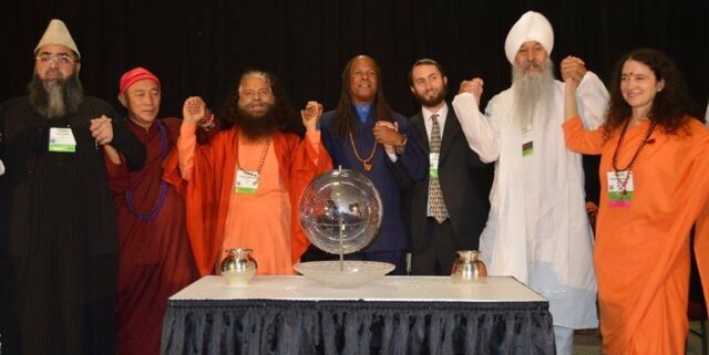L to R: Imam Umer Ahmed Ilyasi, Pujya Swami Chidanand Saraswati, Michael Bernard Beckwith, Yonatan Neril, Singh Sahib Satpal Singh and Sadhvi Bhagawati Saraswati. October 15, 2015 at Salt Lake City Parliament of World Religions event. Langar hall organized by Guru Nanak Nishkam Sevwak Jatha (U.K.) Parliament of the World's Religions